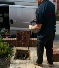 Clearing blocked drains in Hersham
